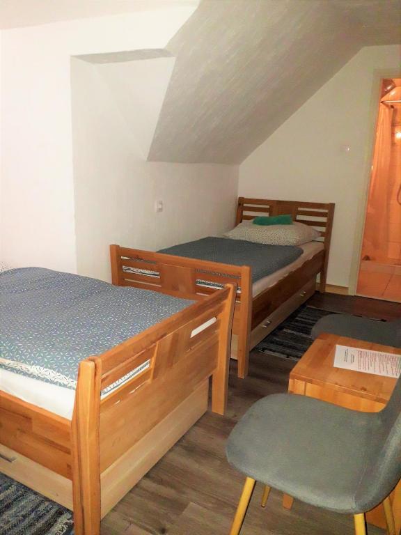 Postel nebo postele na pokoji v ubytování Kristály Vendégház