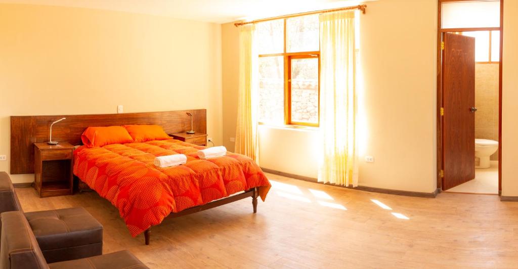 Voodi või voodid majutusasutuse Allin Illary Eco Hospedaje toas