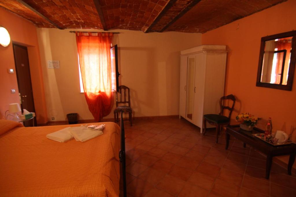 Postel nebo postele na pokoji v ubytování Il sogno di maggy
