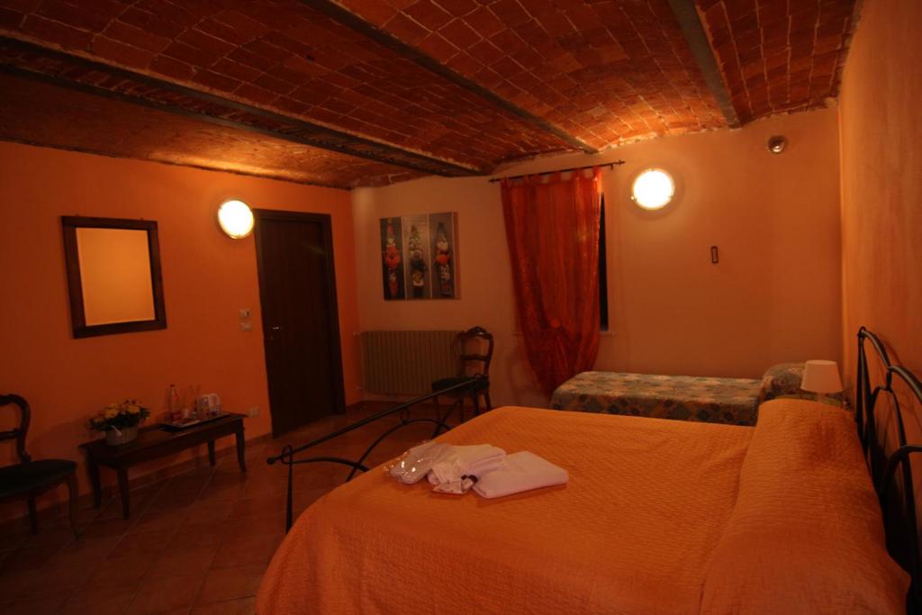 Postel nebo postele na pokoji v ubytování Il sogno di maggy