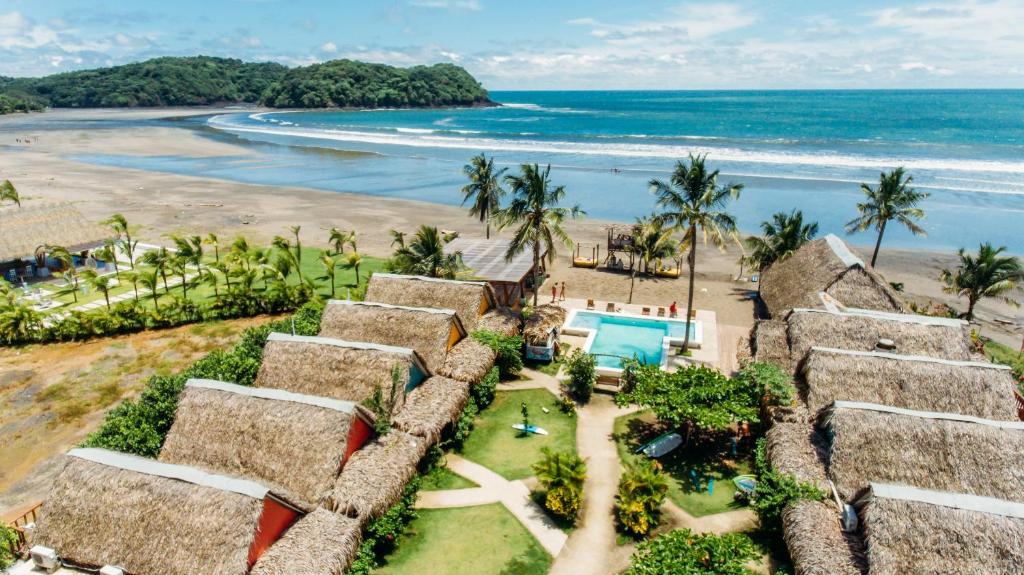 an aerial view of a resort on the beach at Selina Playa Venao in Playa Venao