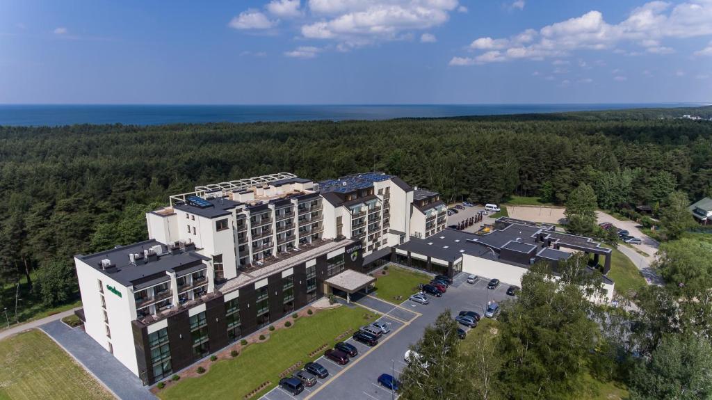 an aerial view of a hotel with a parking lot at Gradiali Wellness and SPA in Palanga
