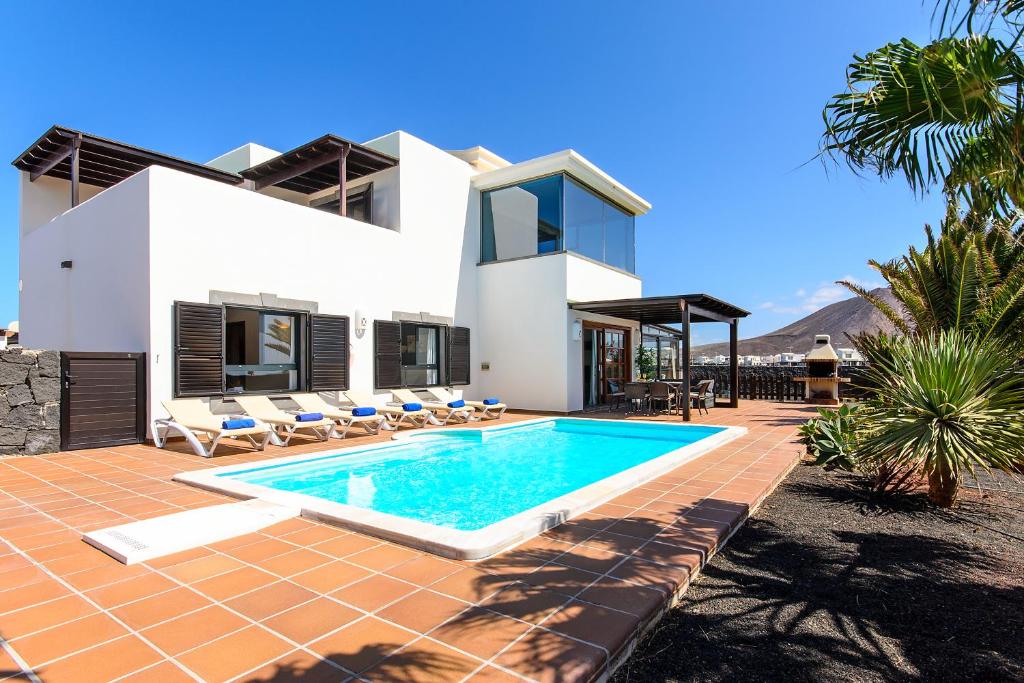 Bazén v ubytování Hipoclub Villas,"Tabaro"villa nebo v jeho okolí