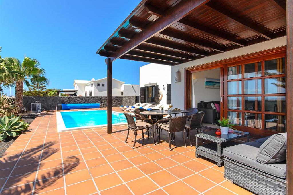Bazén v ubytování Hipoclub Villas,"Tabaro"villa nebo v jeho okolí