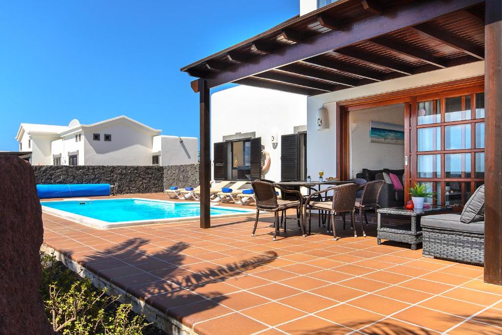 Bazén v ubytování Hipoclub Villas,"Tabaro"villa nebo v jeho okolí