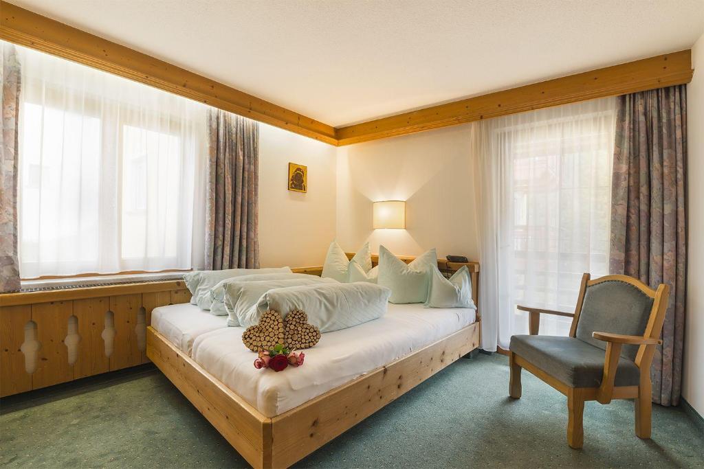 Postel nebo postele na pokoji v ubytování Hotel Ehrenreich