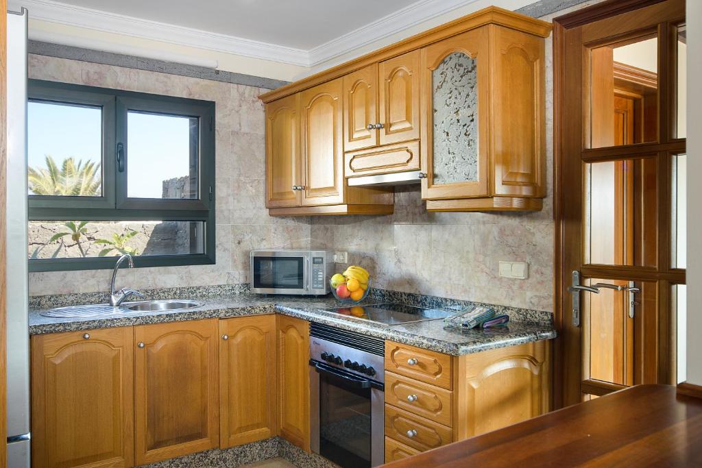 Kuchyň nebo kuchyňský kout v ubytování Hipoclub Villas,"Tabaro"villa