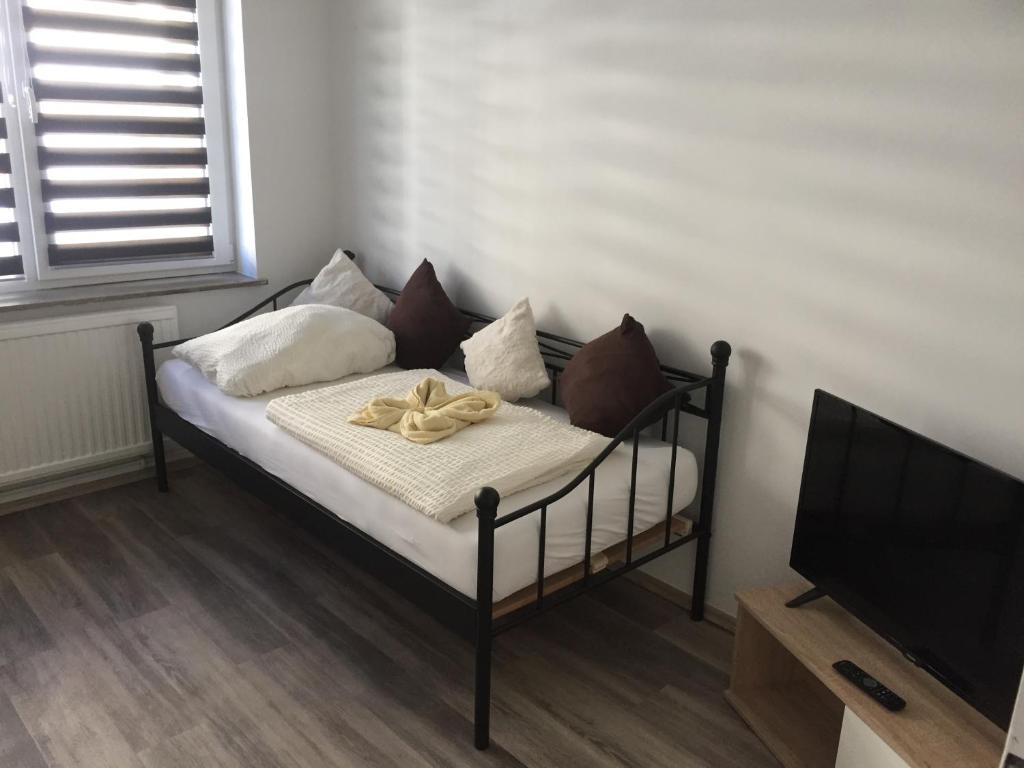 Postel nebo postele na pokoji v ubytování Apartment Hildesheim