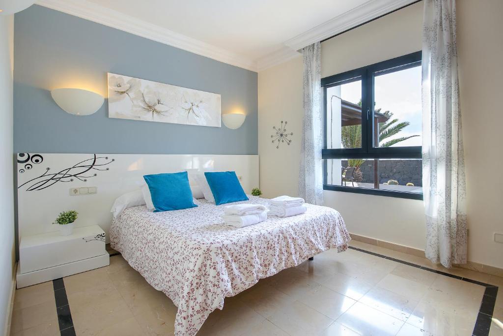 Postel nebo postele na pokoji v ubytování Hipoclub Villas,"Tabaro"villa