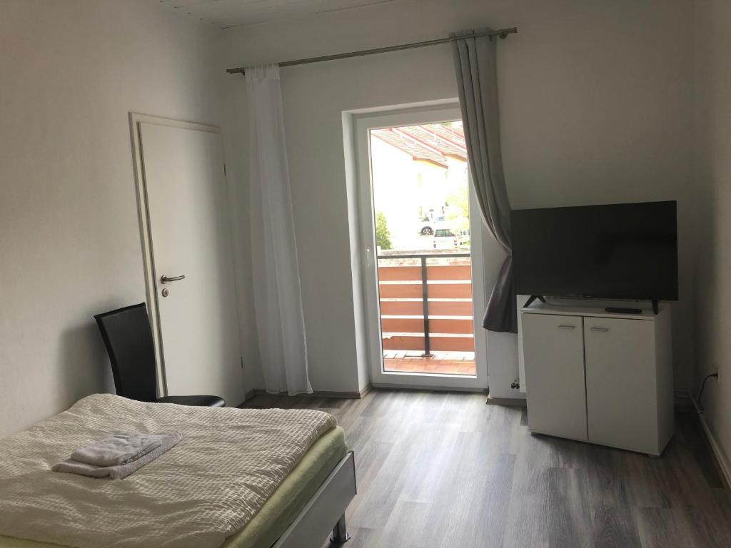 Postel nebo postele na pokoji v ubytování Apartment Hildesheim