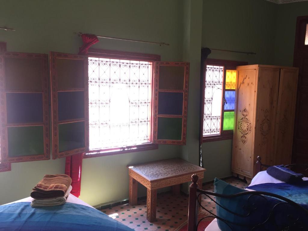 Llit o llits en una habitació de Riad Selma