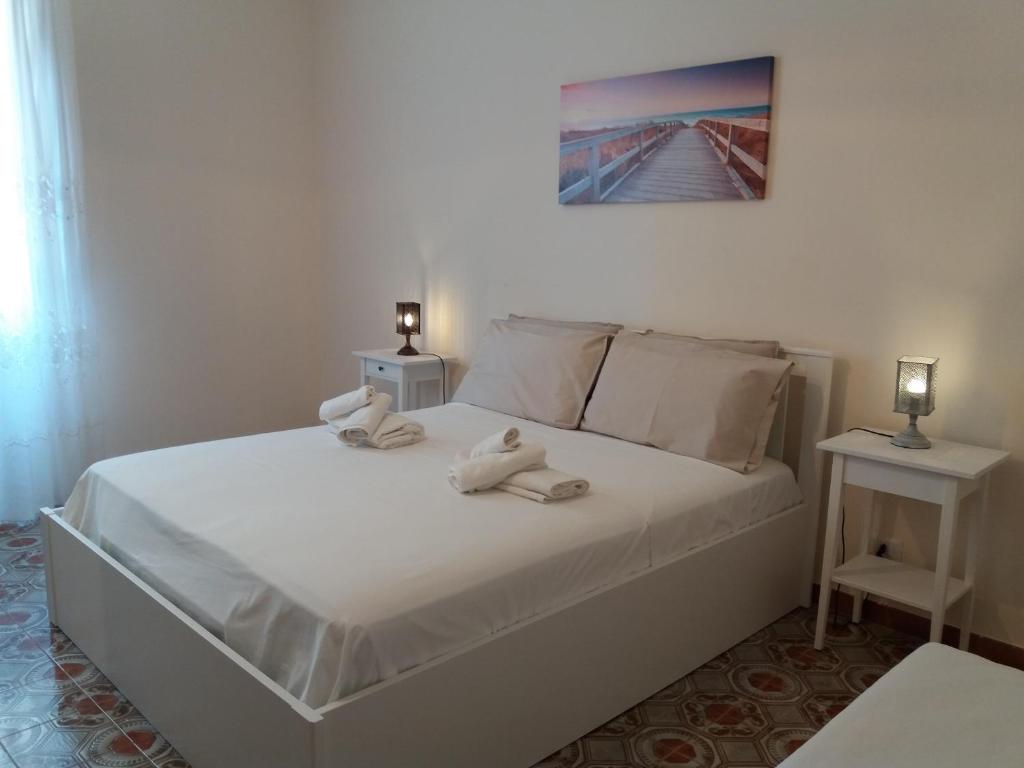 Posteľ alebo postele v izbe v ubytovaní B&B La Veranda