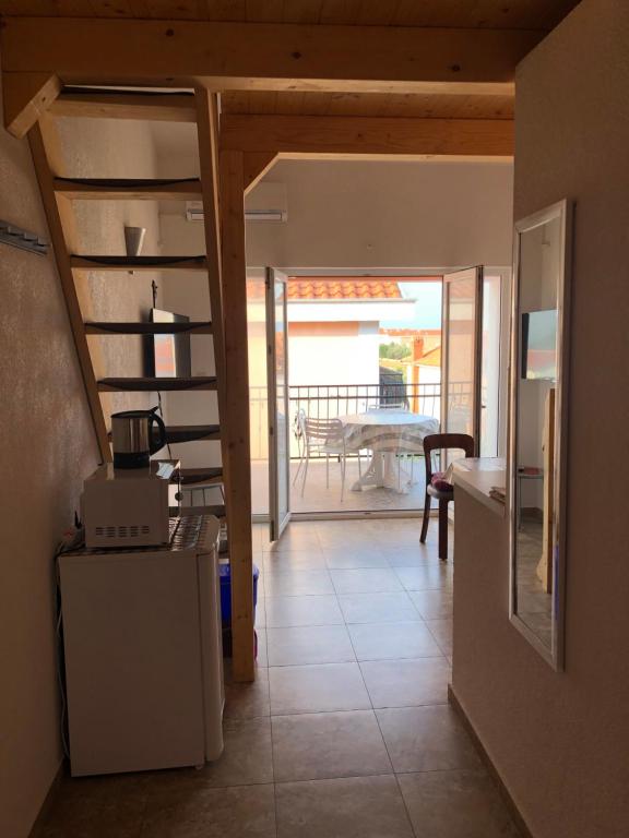 Kuchyňa alebo kuchynka v ubytovaní Apartments Zrakic
