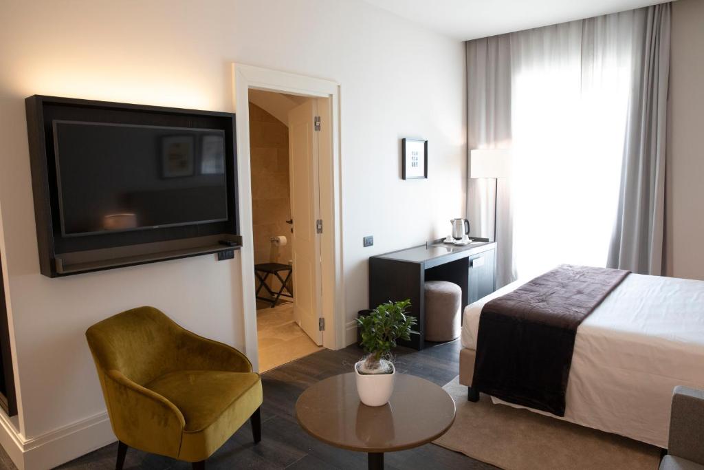 TV a/nebo společenská místnost v ubytování DOGANA RESORT