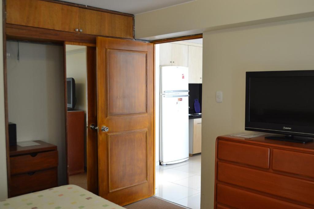TV a/nebo společenská místnost v ubytování Suite Service Apart Hotel