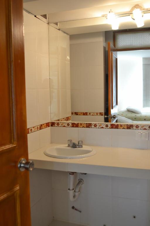 Koupelna v ubytování Suite Service Apart Hotel