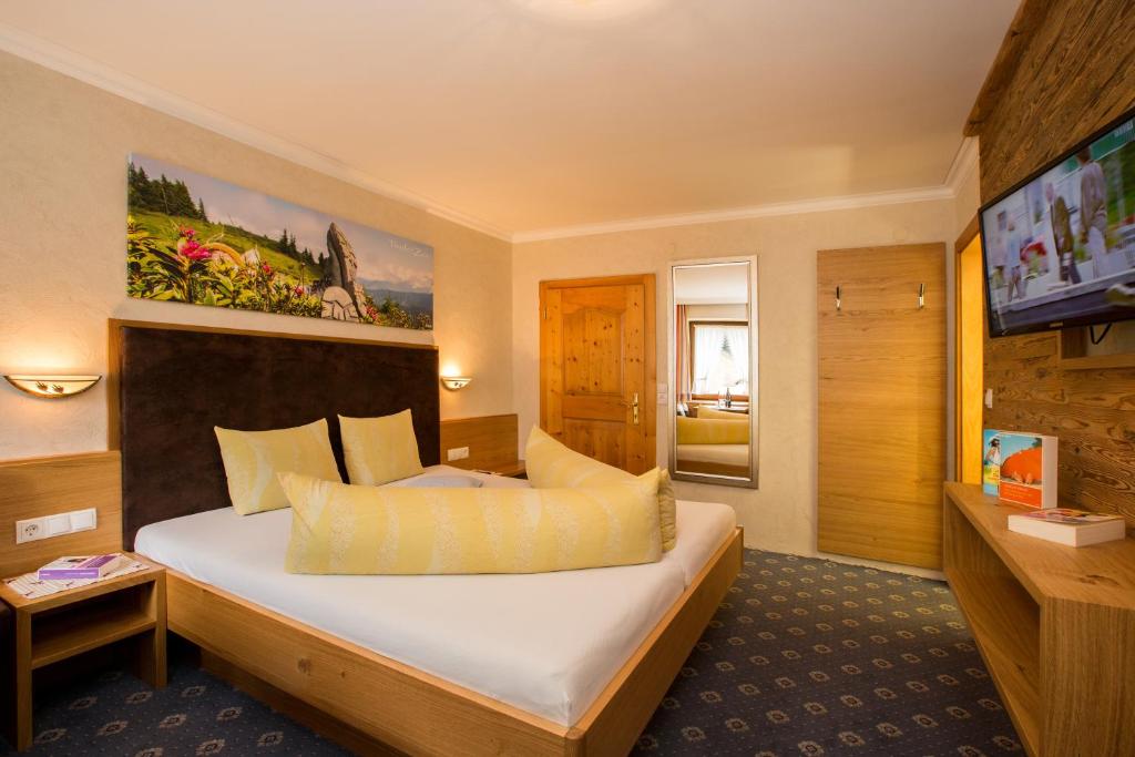 Postel nebo postele na pokoji v ubytování Hotel Jägerhof
