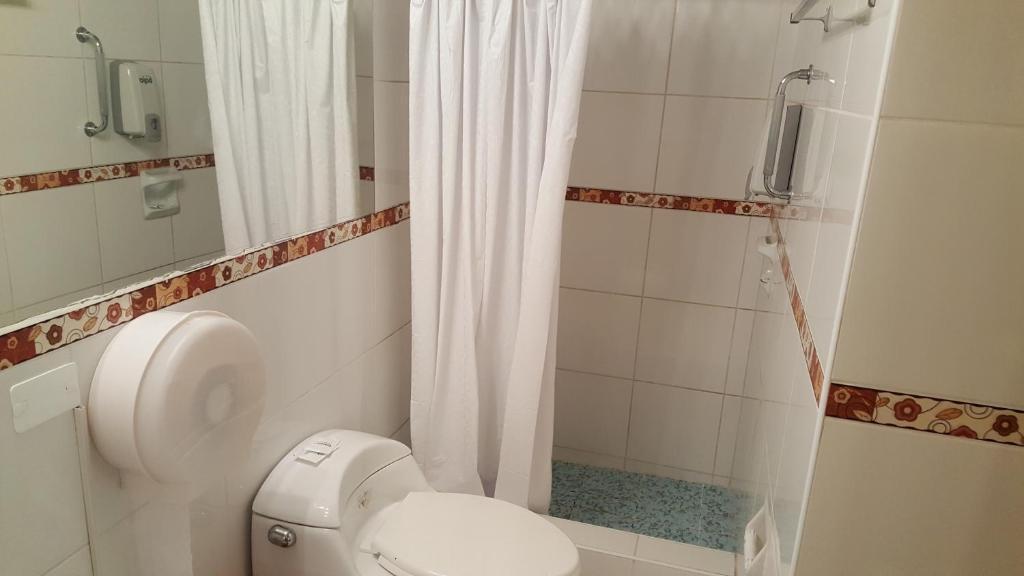 Koupelna v ubytování Suite Service Apart Hotel