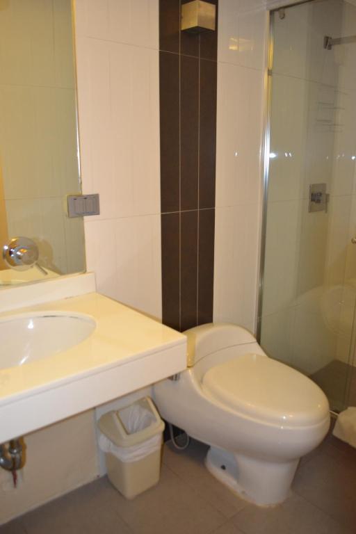 Koupelna v ubytování Suite Service Apart Hotel