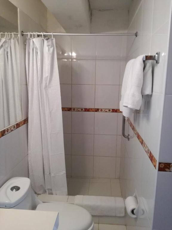 Koupelna v ubytování Suite Service Apart Hotel