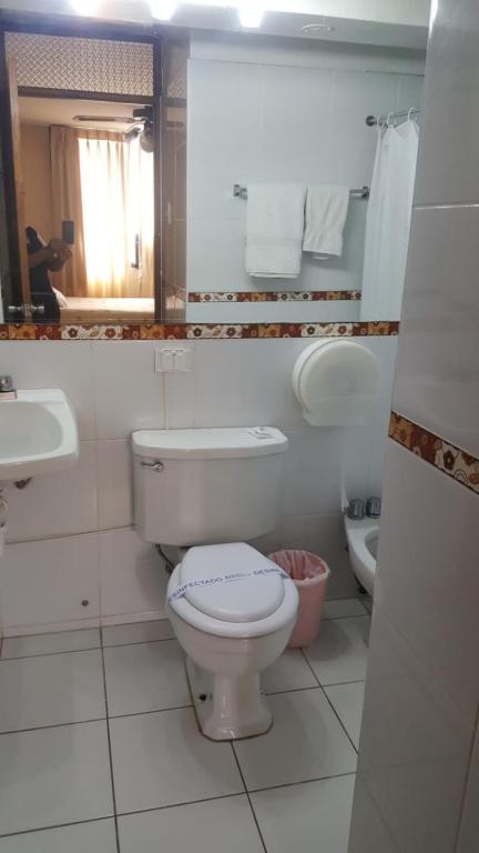 Koupelna v ubytování Suite Service Apart Hotel