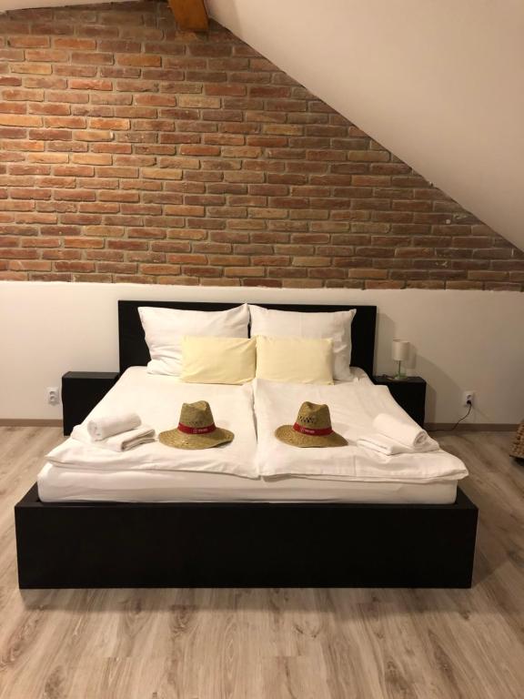 Postel nebo postele na pokoji v ubytování Penzion Lednice