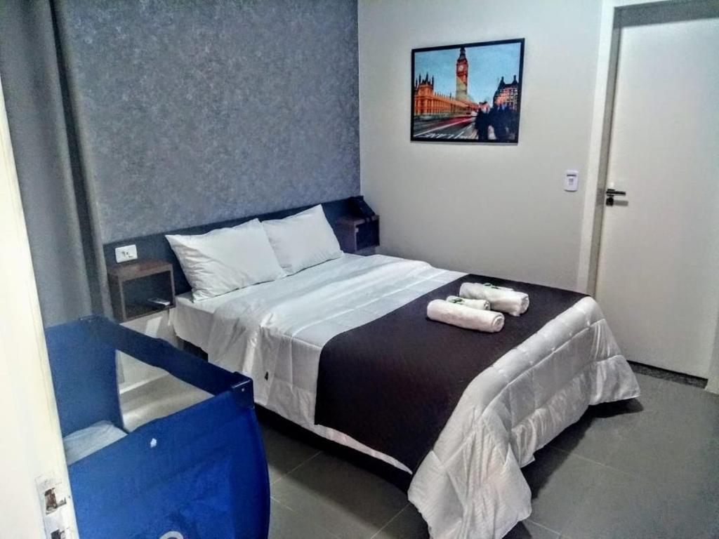 Postel nebo postele na pokoji v ubytování London Executive Hotel