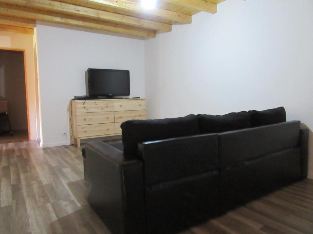 TV a/nebo společenská místnost v ubytování Gîte Potimarron