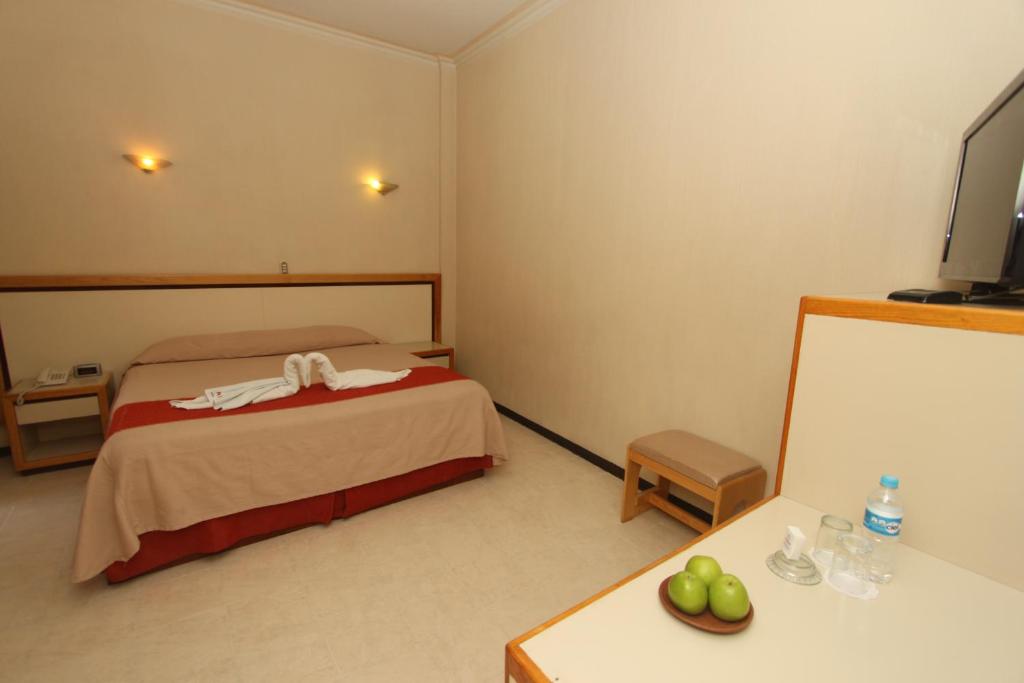 Postel nebo postele na pokoji v ubytování Hotel Ferri