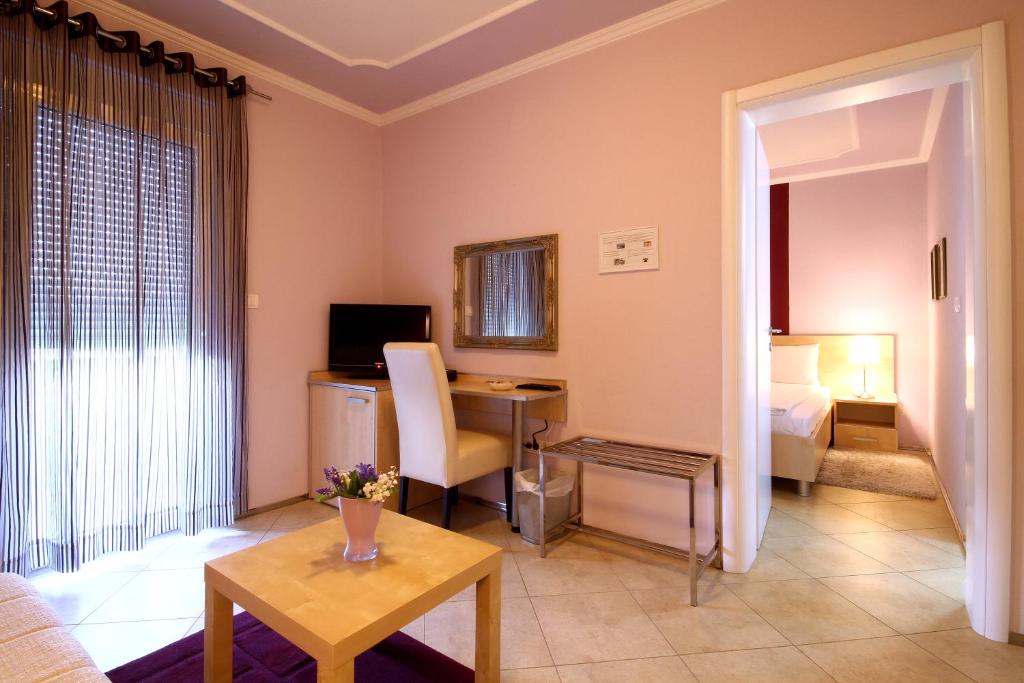 TV a/nebo společenská místnost v ubytování Hotel Aruba