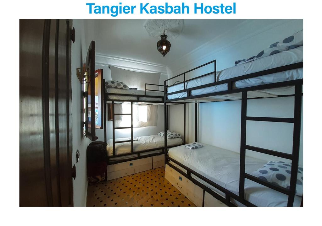 Voodi või voodid majutusasutuse Tangier Kasbah Hostel toas
