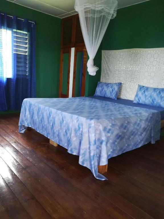 Postel nebo postele na pokoji v ubytování TOGA GUEST HOUSE