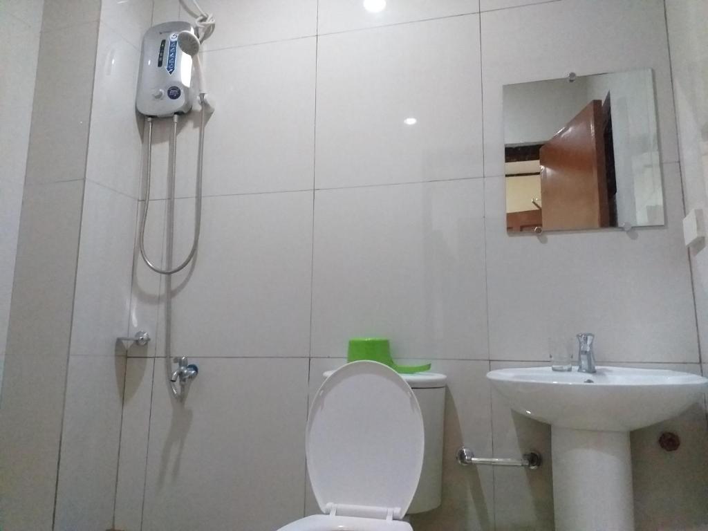 Koupelna v ubytování Devayn's Inn