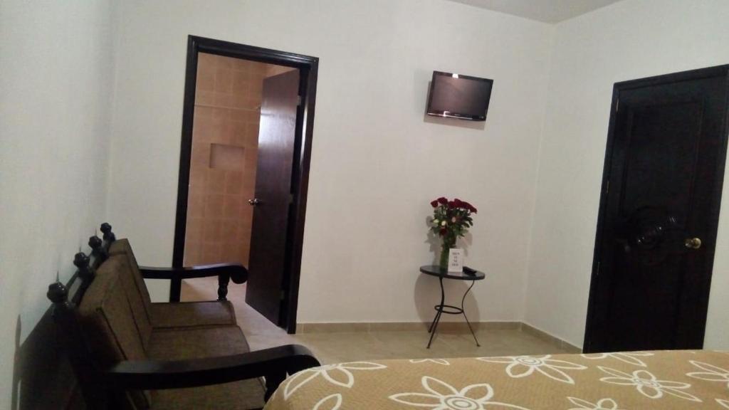 Postel nebo postele na pokoji v ubytování Casa de Cactus