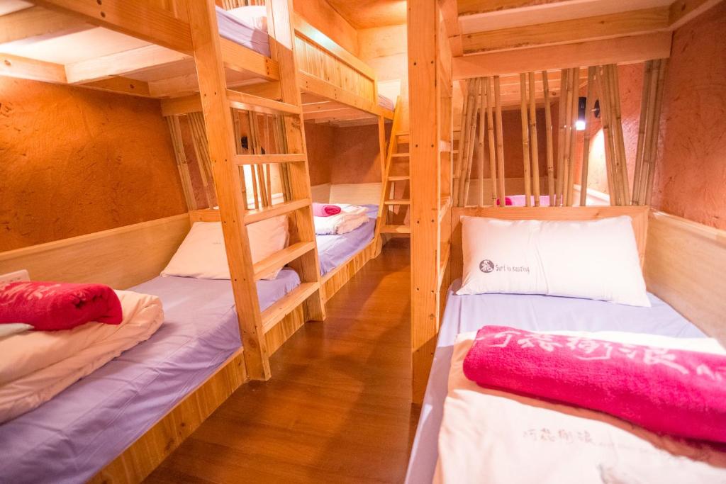 Postel nebo postele na pokoji v ubytování Kenting Afei Surf Hostel Nanwan