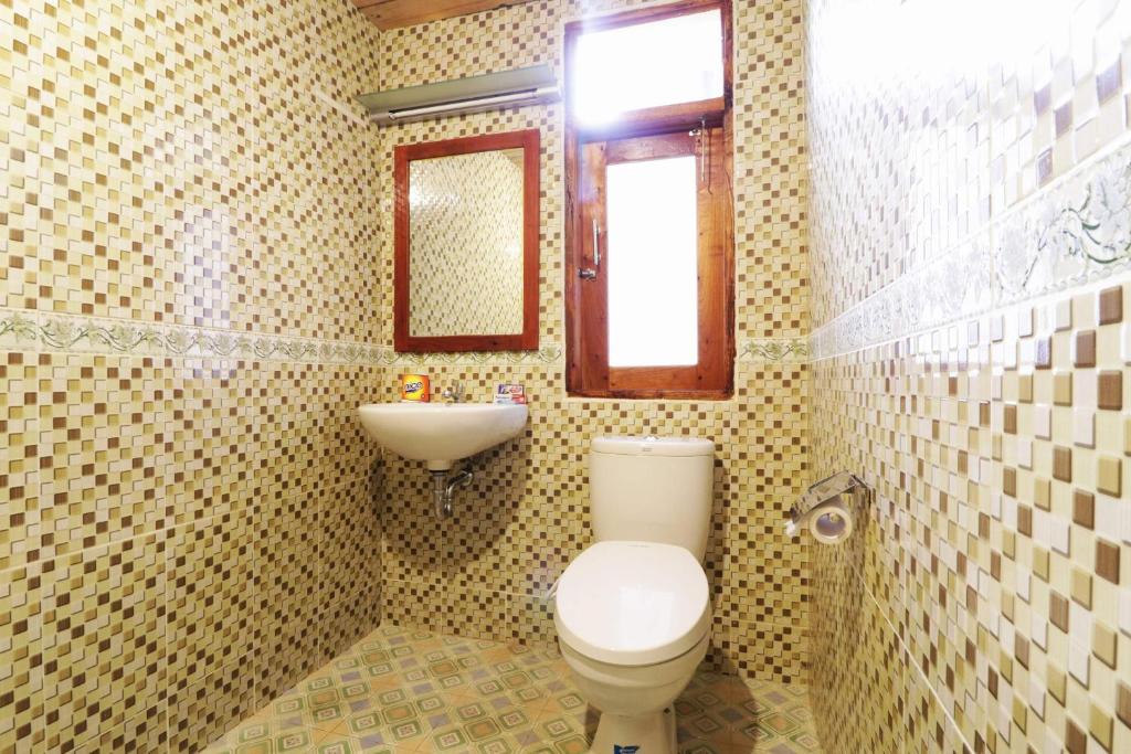 Bagno di Tuk Tuk Timbul Bungalows