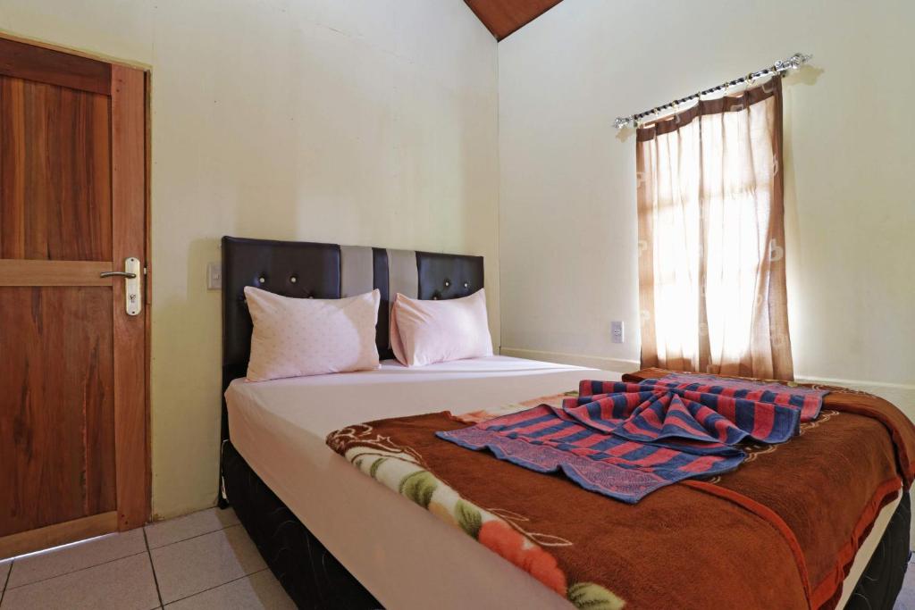 Tuk Tuk Timbul Bungalows - Family Bungalow