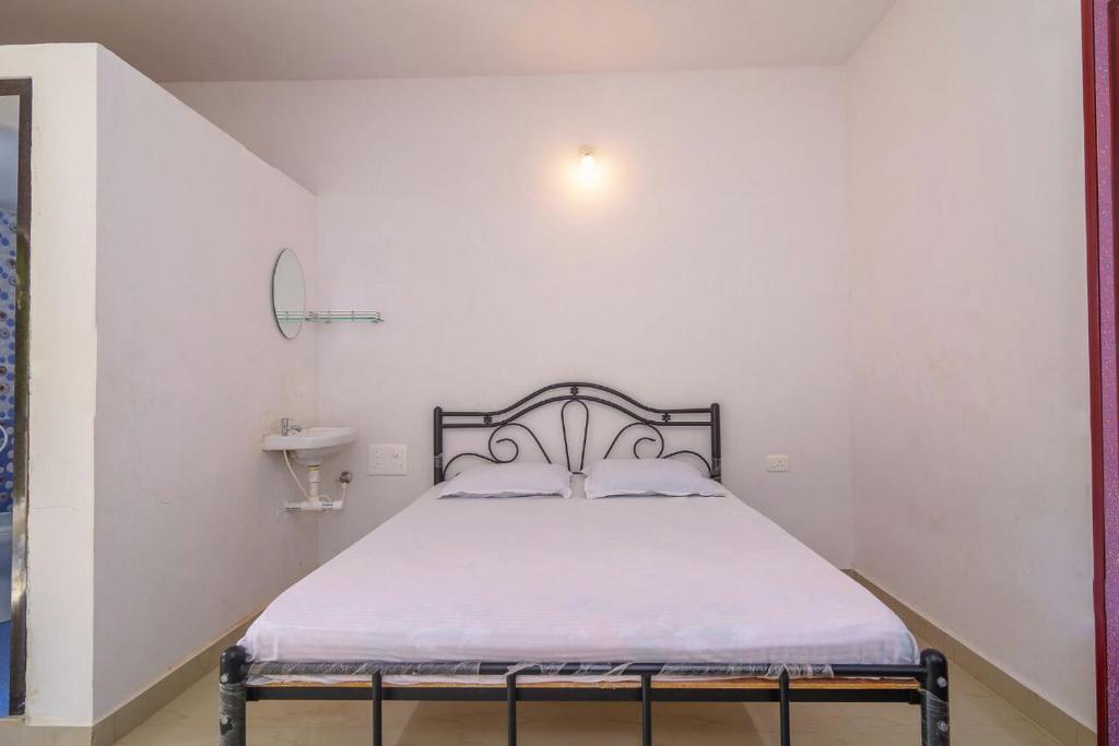 Postel nebo postele na pokoji v ubytování Casa Nobert