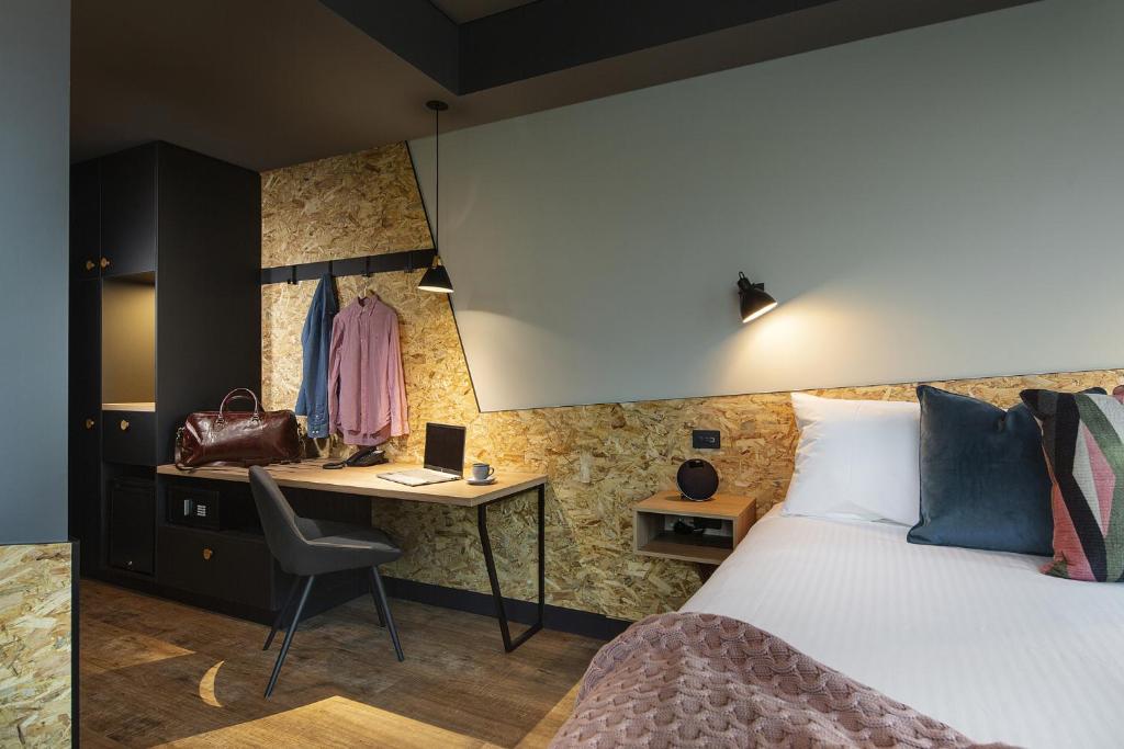 Postel nebo postele na pokoji v ubytování Marion Hotel