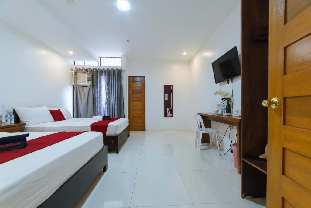 RedDoorz Plus @ San Roque Roxas City - Tripla Stanza