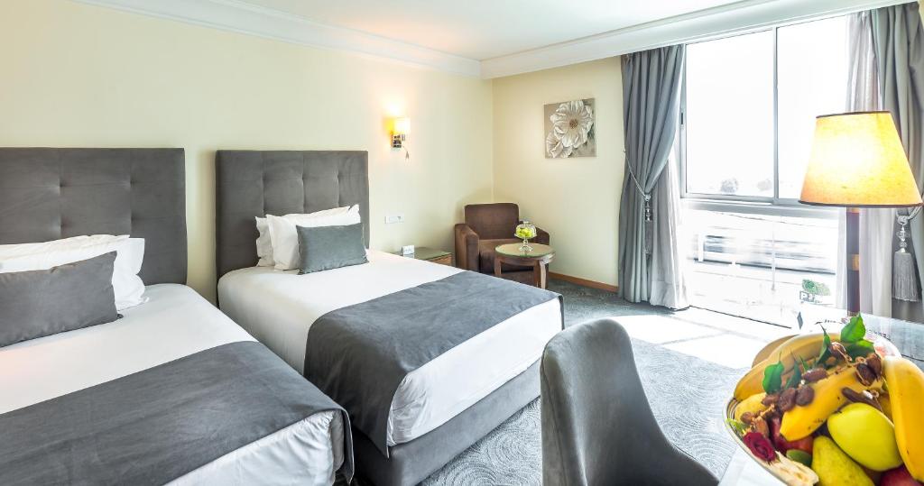 Postel nebo postele na pokoji v ubytování Hotel Borj Rabat - A member of Barceló Hotel Group