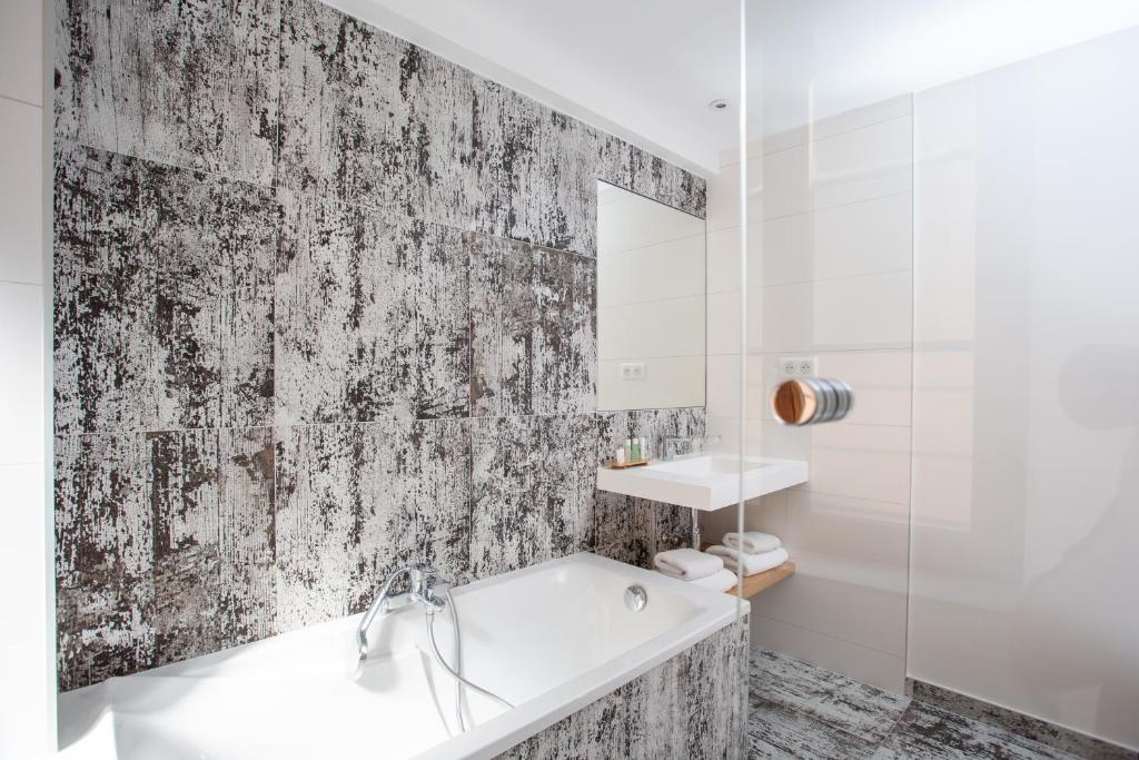 Koupelna v ubytování Hôtel Le Rapp