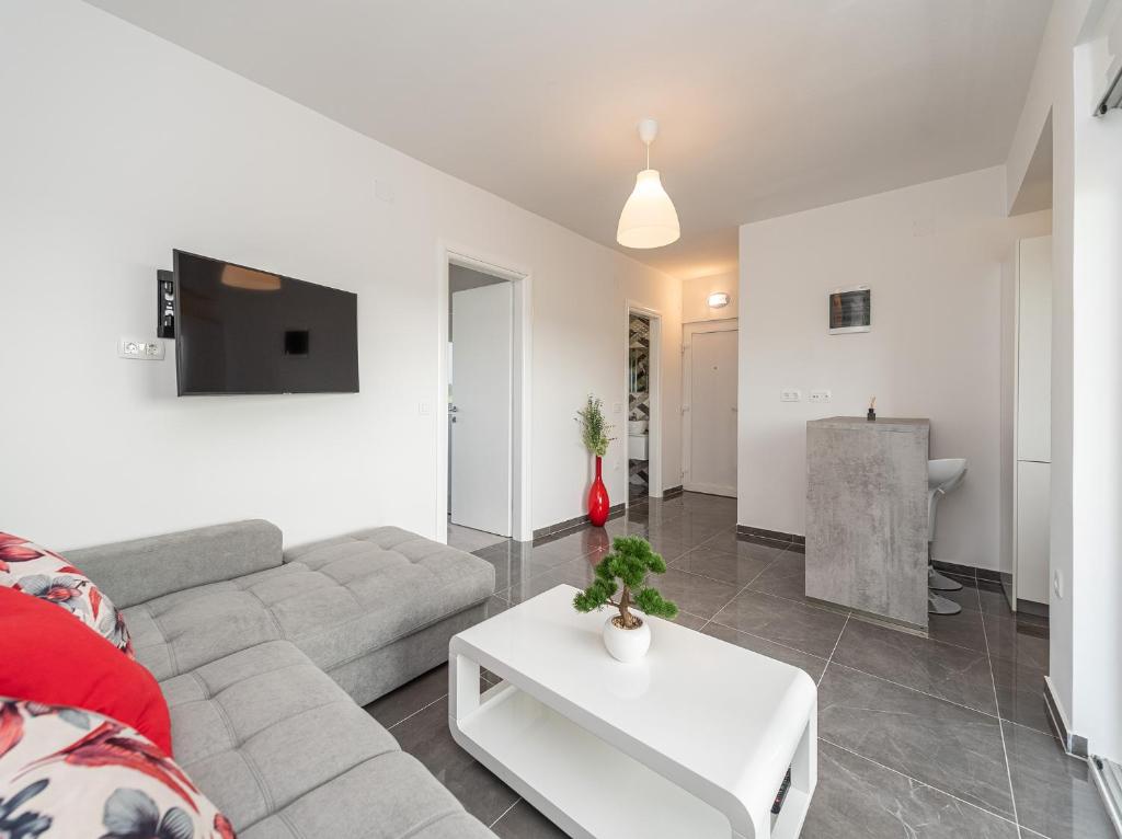 Telewizja i/lub zestaw kina domowego w obiekcie Villa Contessa