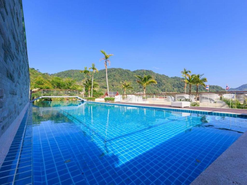 Bazén v ubytování Indochine Resort and Villas - SHA Extra Plus nebo v jeho okolí