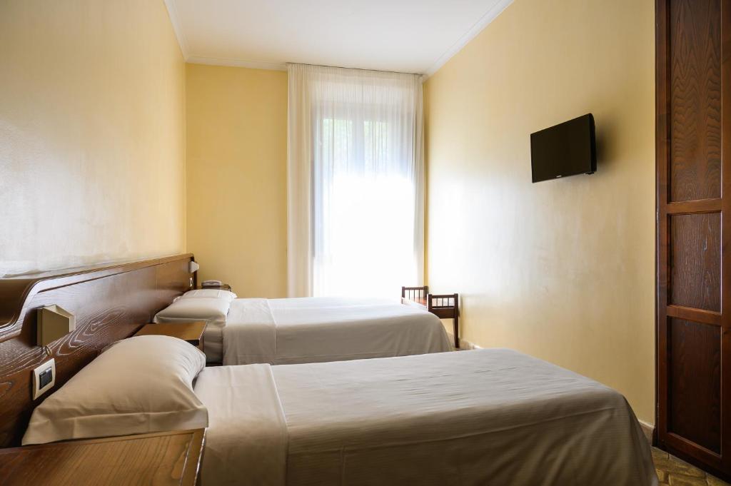 Postel nebo postele na pokoji v ubytování Casa I Cappuccini
