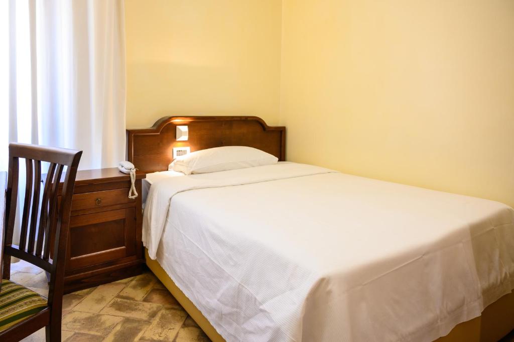 Postel nebo postele na pokoji v ubytování Casa I Cappuccini
