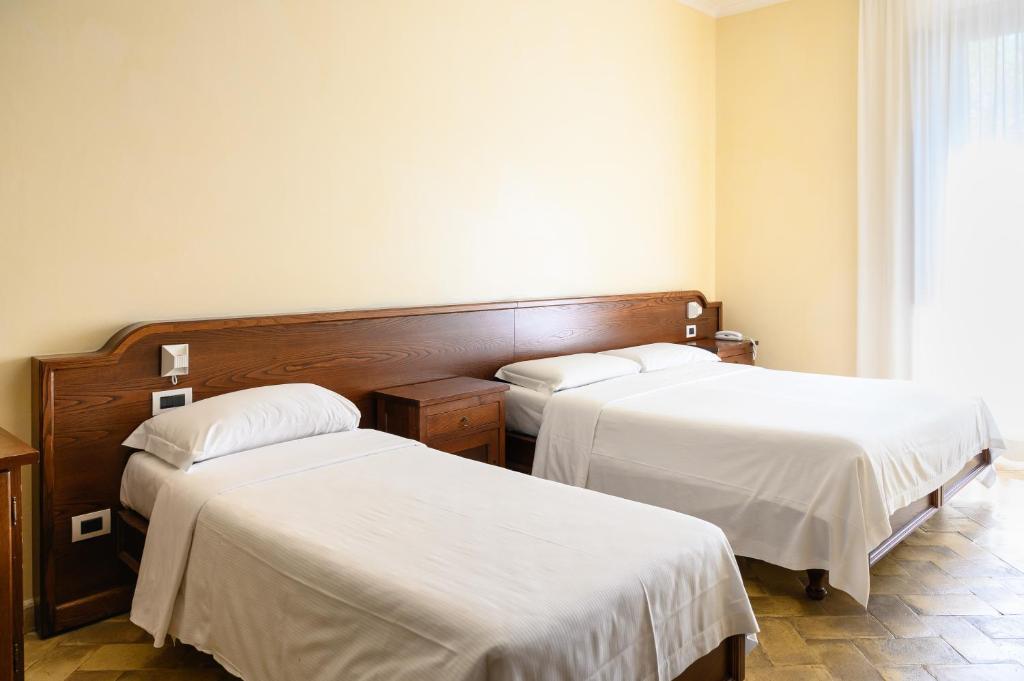 Postel nebo postele na pokoji v ubytování Casa I Cappuccini