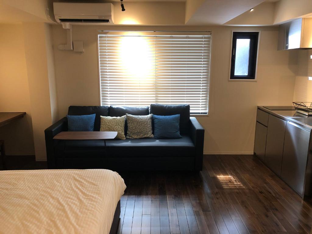 Postel nebo postele na pokoji v ubytování Condominium MIRAHAKONE