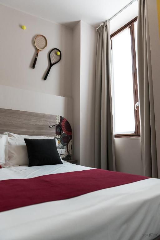 Posteľ alebo postele v izbe v ubytovaní Residenza del Borgo
