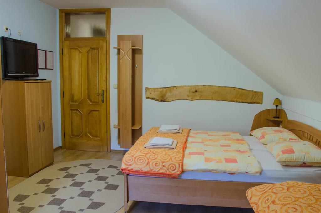 Postel nebo postele na pokoji v ubytování Miškar Rooms